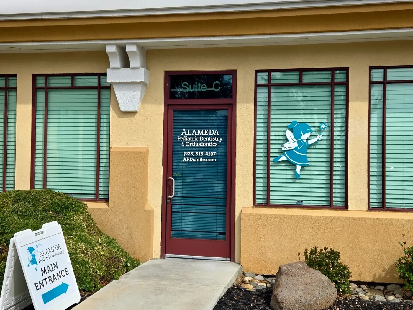 The Brentwood office's exterior entrance with mascot signage