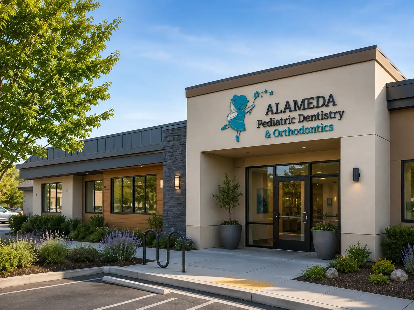 The practice exterior with its teal awning and parking out front