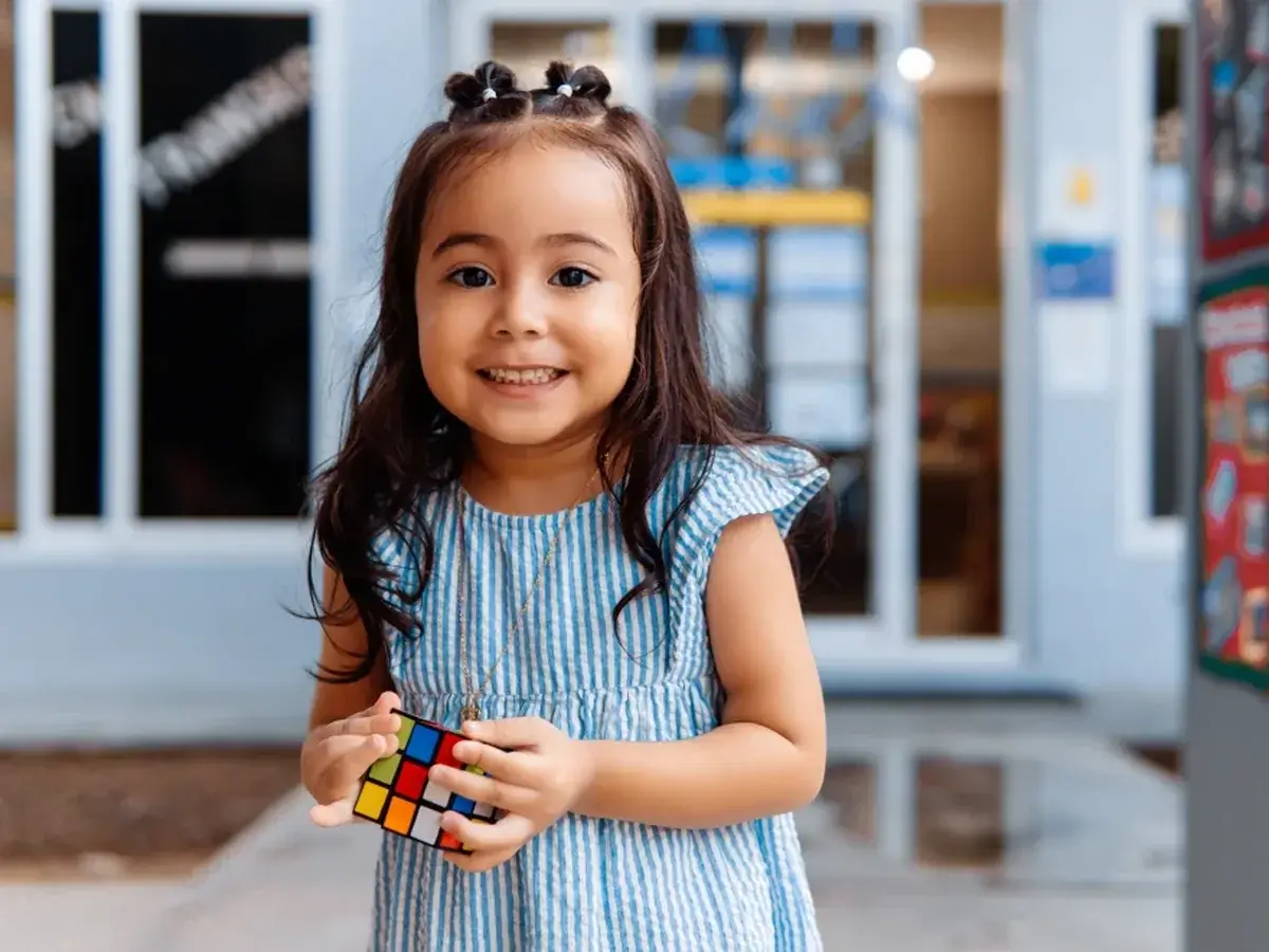 A young patient smiling during a visit