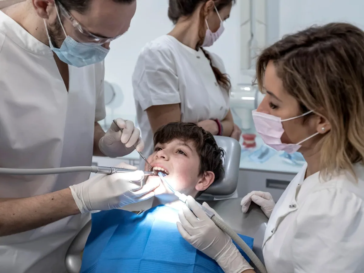 A teenage patient smiling during a visit