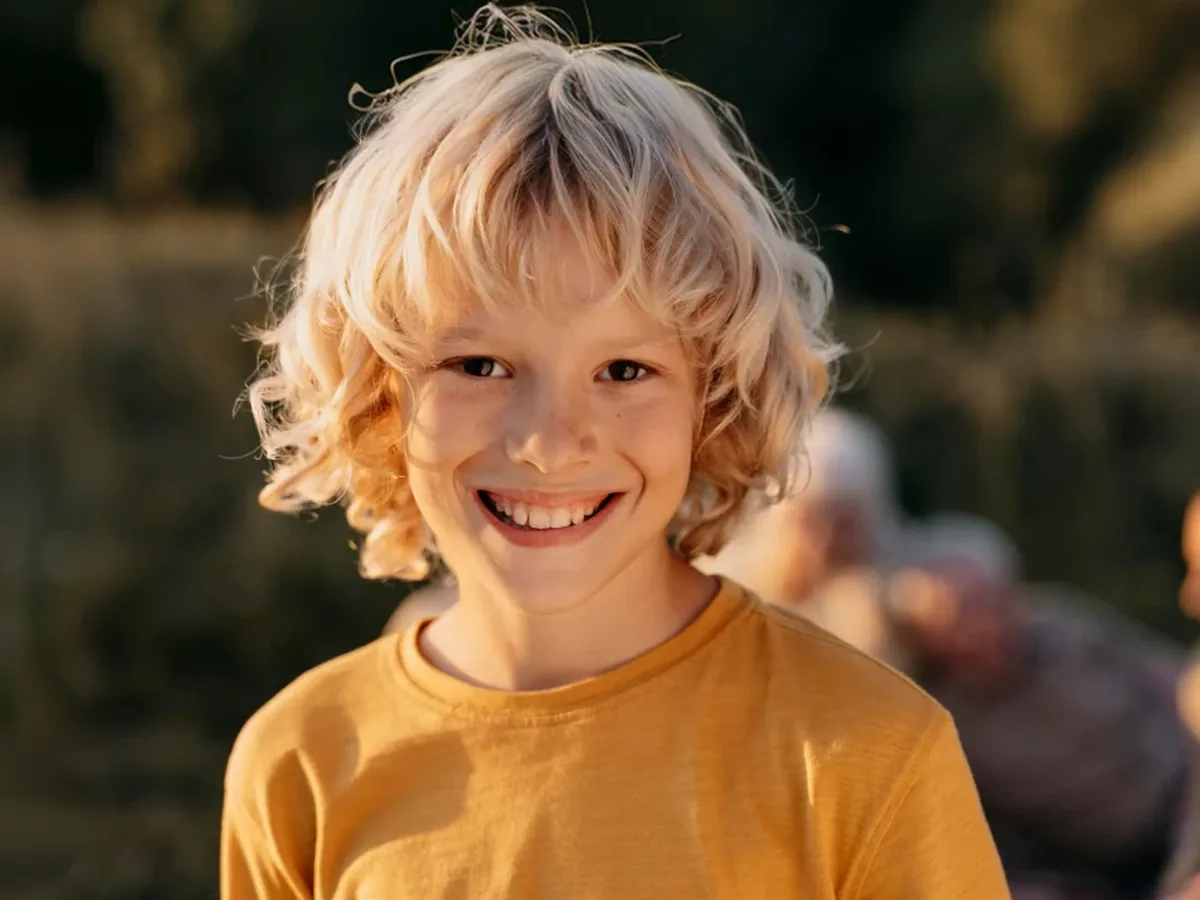 A young patient smiling during a visit