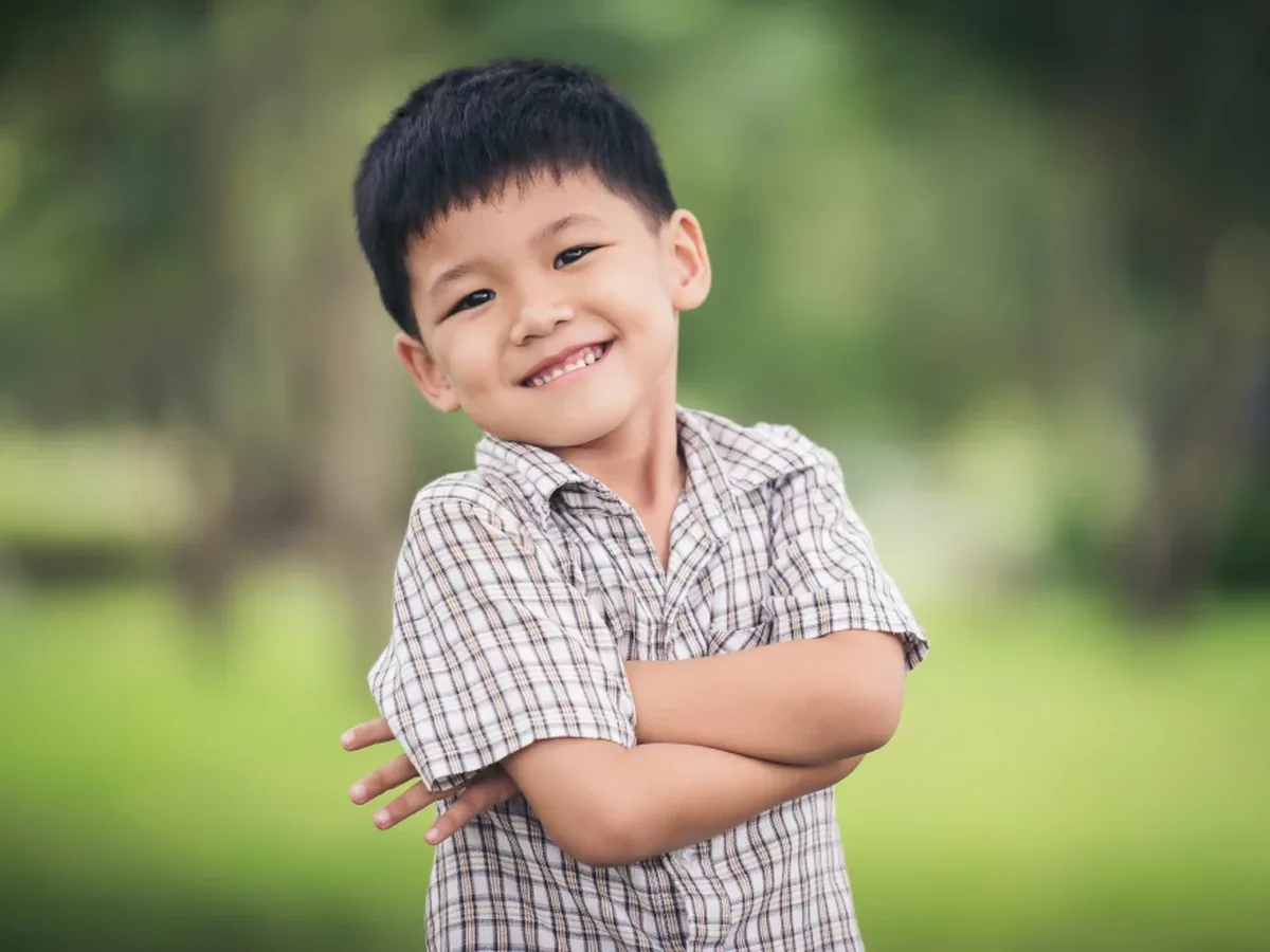A young patient smiling during a visit